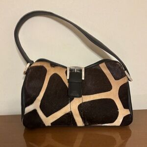 Elegant Black and Brown Shoulder Bag.  Back wall and center zipper pockets